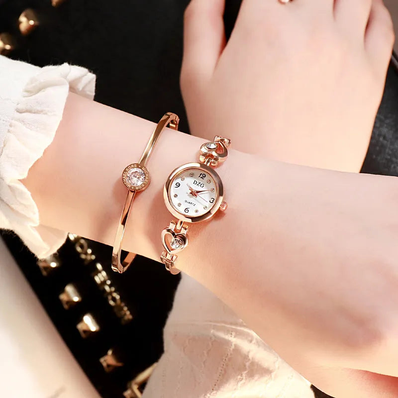 Women's simple rhinestone casual square watch with gold alloy strap and stainless steel buckle on white background