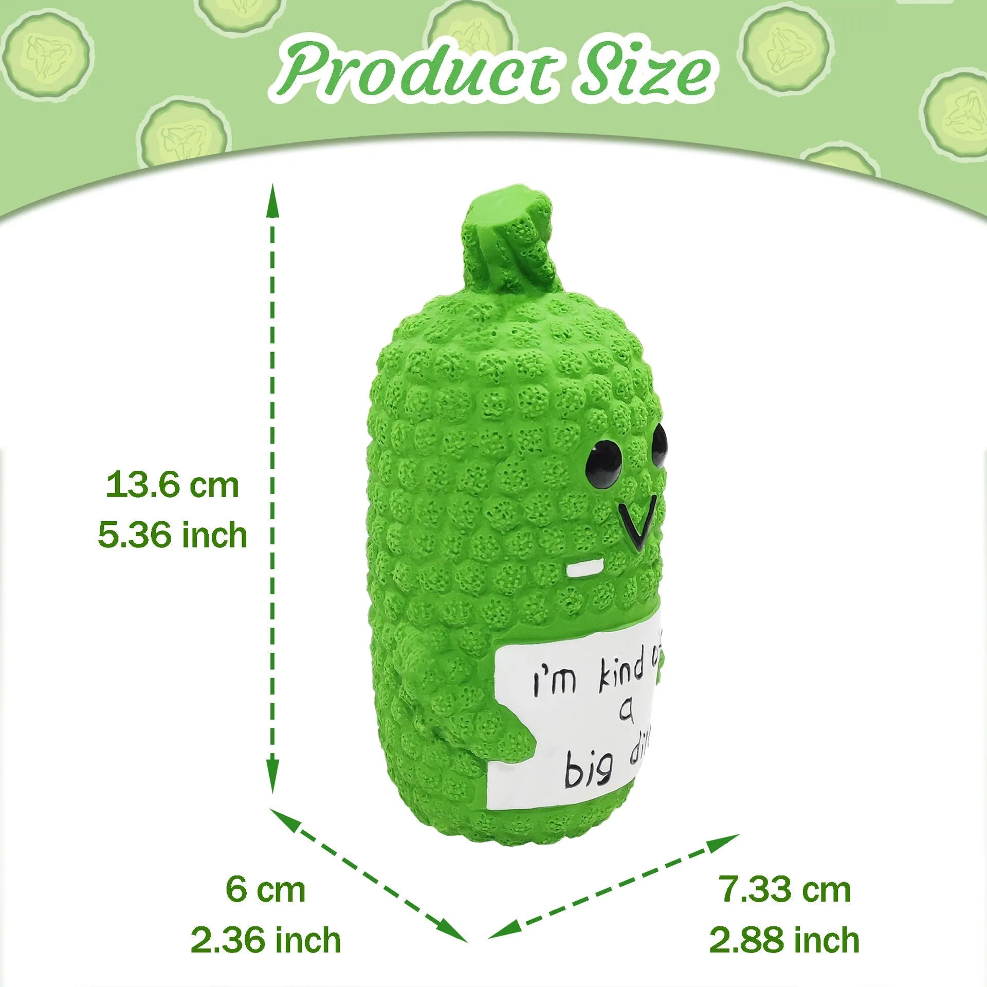 Green pickle-shaped squeaky dog toy with textured nubs, shown next to a measuring tape indicating 13.6 cm length.