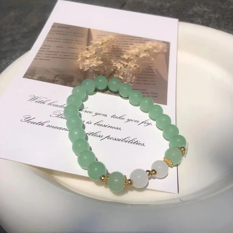 Chinese style bamboo leaf glass bracelet for women with manual craftsmanship.