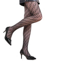 Halloween spider web leopard print fishnet stockings on women's legs, seamless black nylon with pattern