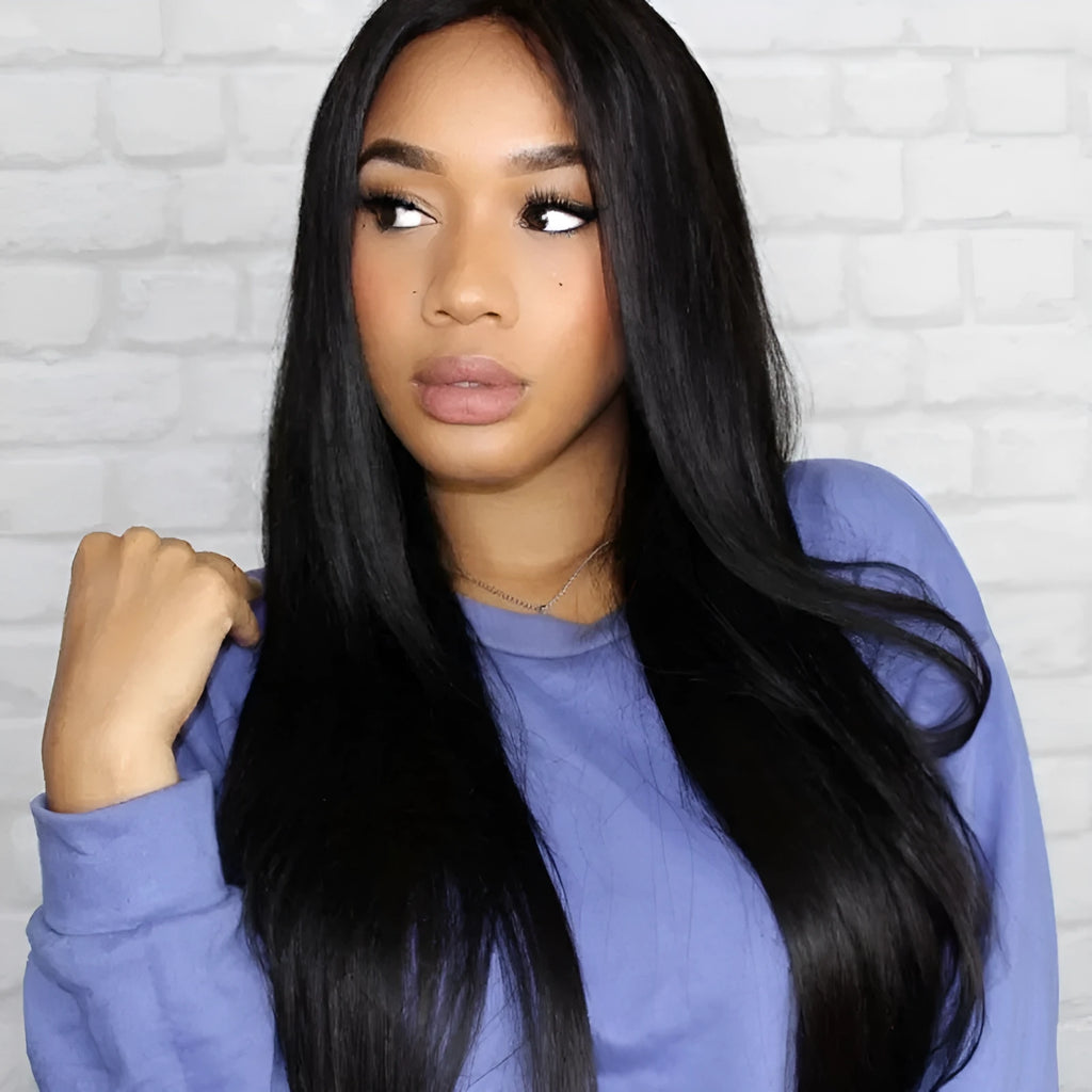 Long straight black synthetic wig with centre-parted bangs on a mannequin head.