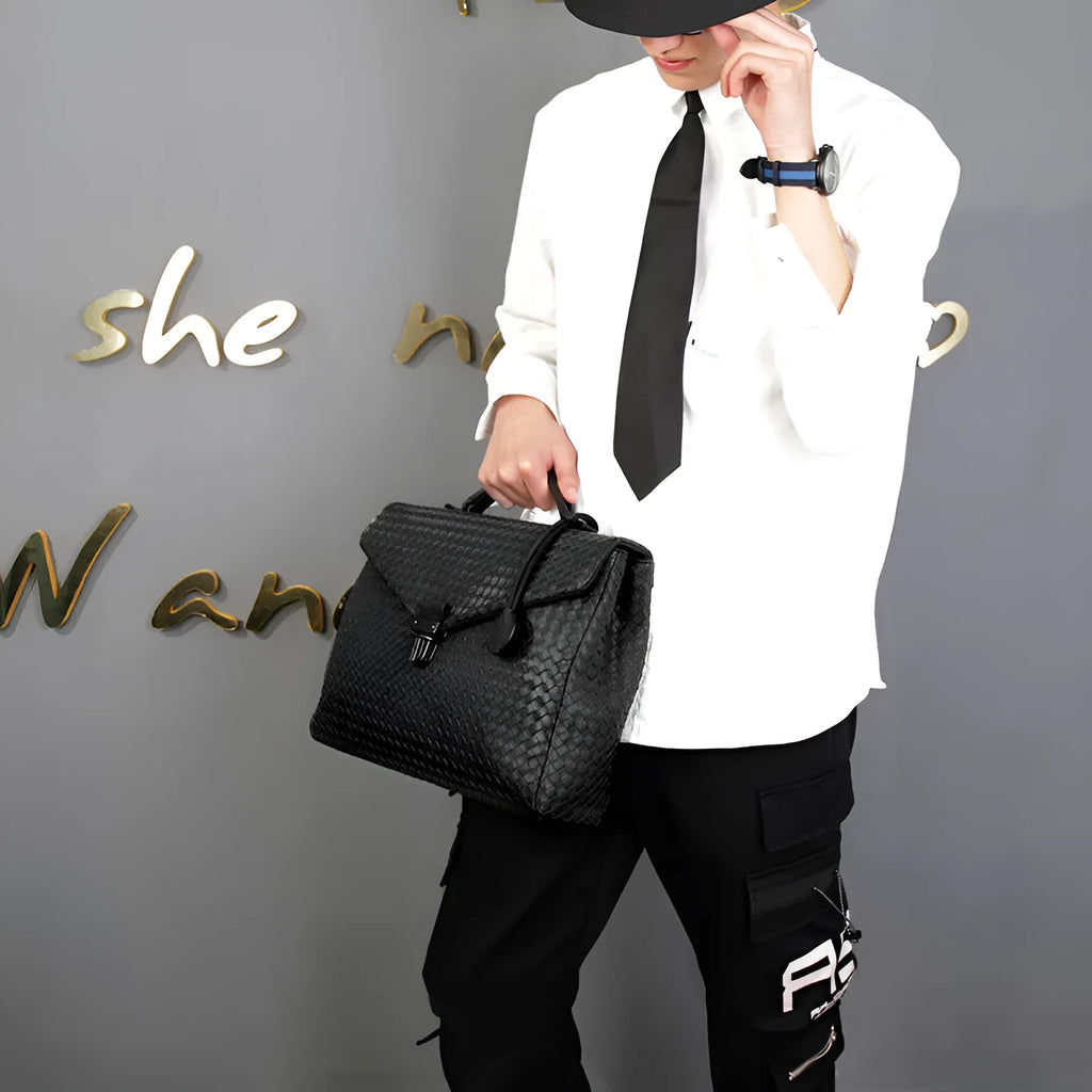 Men's handbag in black super fibre synthetic leather with clamshell knitting pattern, horizontal square shape, latch closure, and soft handle
