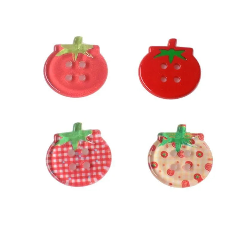 Medium tomato-themed plastic buttons in red colour variations including cherry tomato printing and solid red