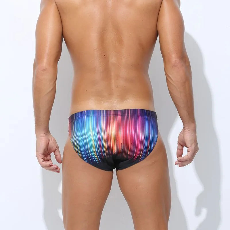 Men's printed polyester swim trunks in colour options ice cream, saibo, skull, streamer, sizes S to XL, front view