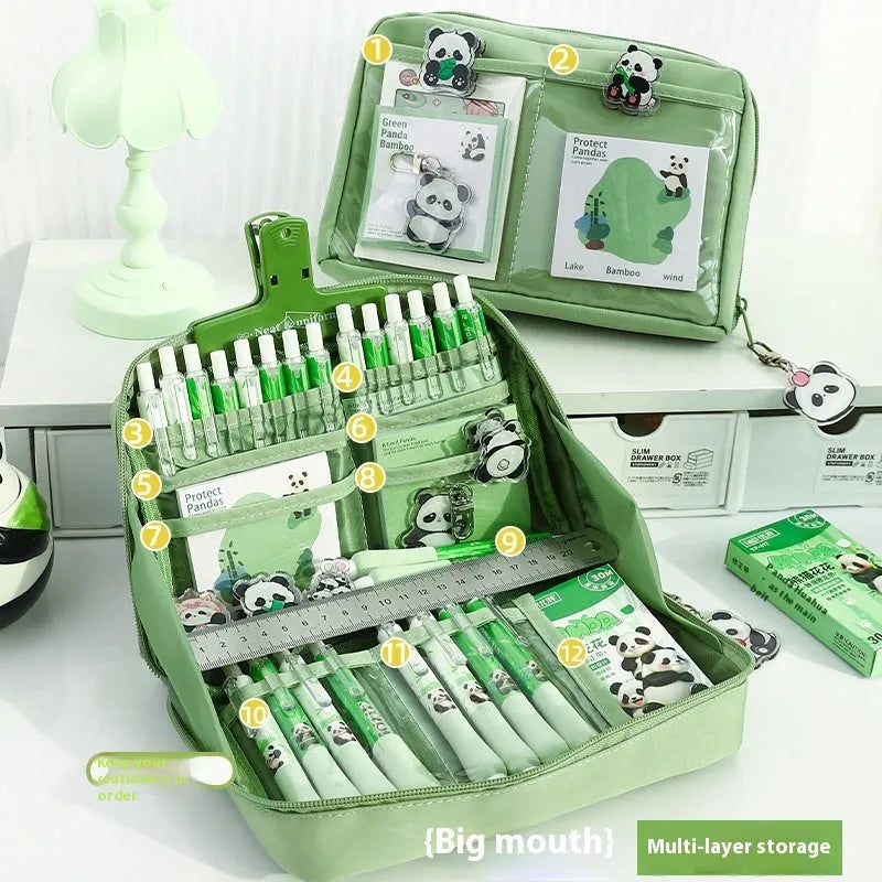Green canvas panda pencil case showing twelve layered compartments open to reveal storage space