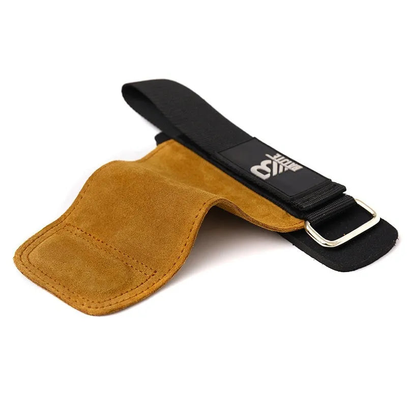 Brown neoprene wrist protector with a wide adjustable strap, shown on a wrist next to a pull-up bar.