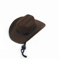 Brown adjustable fabric cowboy hat on a dog, showing rounded brim and headband strap.