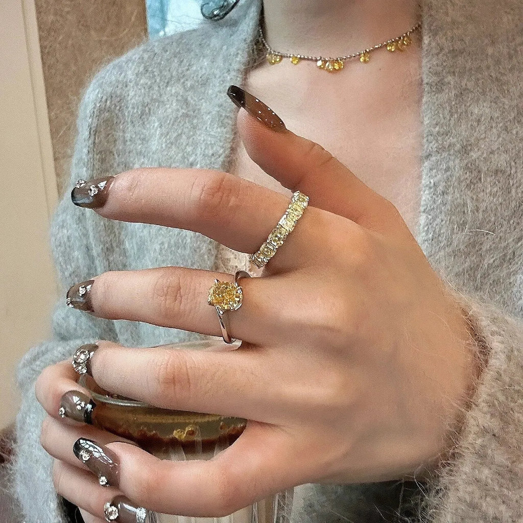 Yellow rock sugar crystal women's ring in polished copper on a hand
