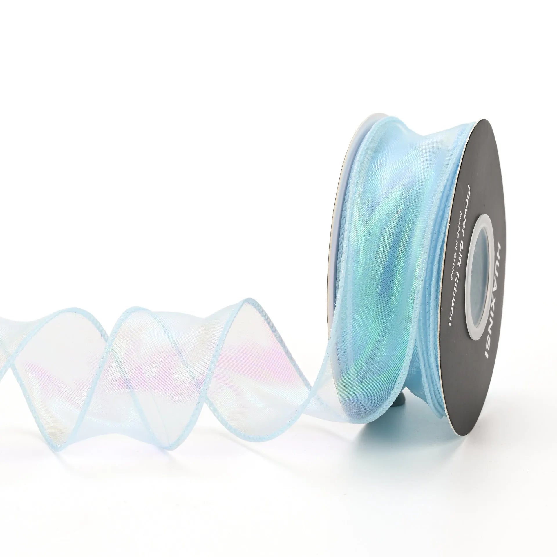 Roll of colourful wave fishtail yarn ribbon in illusion champagne colour, showing textured pattern and 4cm width.