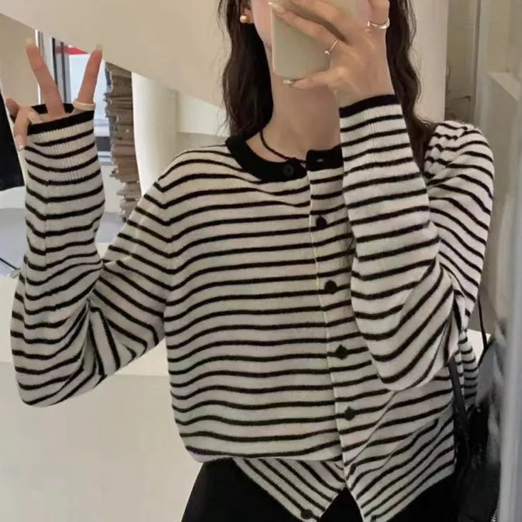 Dark grey and white striped women's cardigan coat with long sleeves and a slim, short fit.