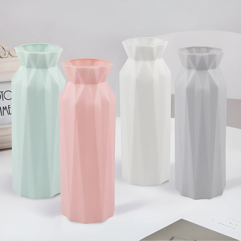Drop-resistant plastic melamine vase in green, grey, pink, or white colour on a table.