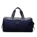 Large black messenger bag made from oxford cloth with a 55-litre capacity.