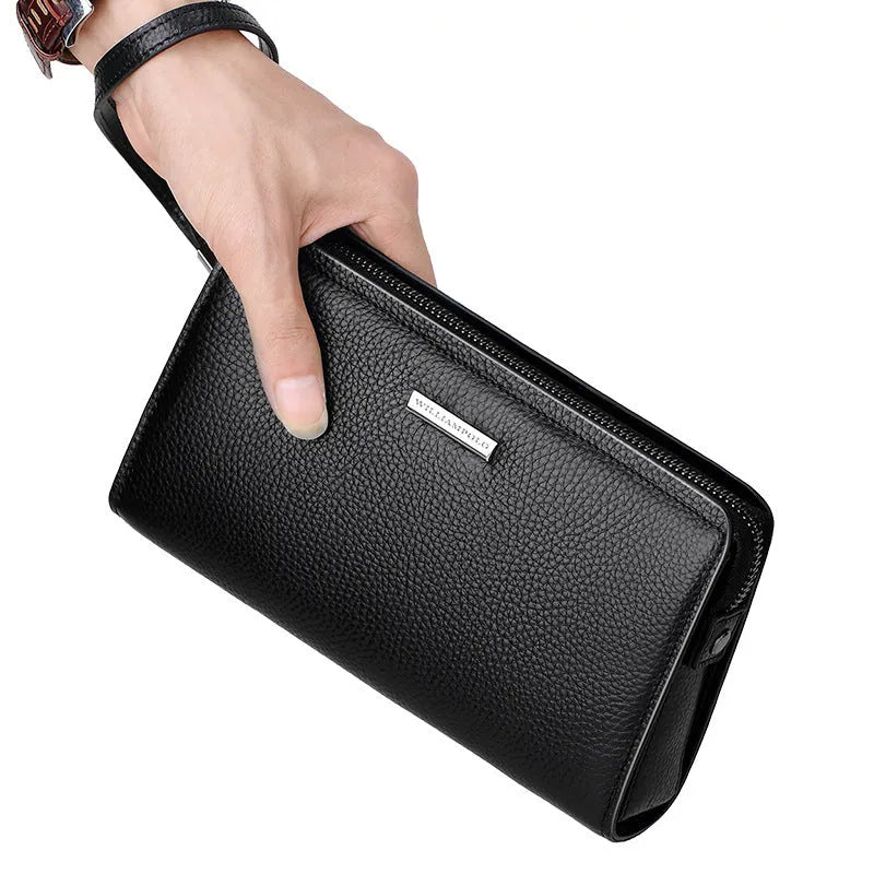 Men's genuine leather clutch wallet with litchi pattern embossing, anti-theft sandwich pocket, and removable handle in black