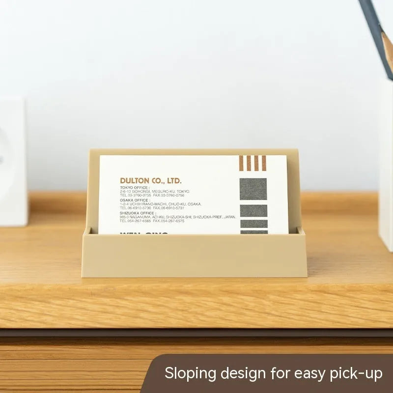 Creative business card storage display stand in geometric design, holds 20 cards, available in five colours