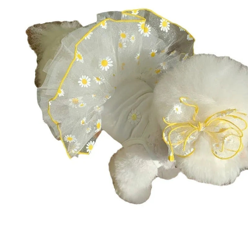 Yellow daisy print summer dog clothes for small to large breeds on pet mannequin