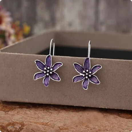 Purple flower-shaped alloy earrings with electroplated finish