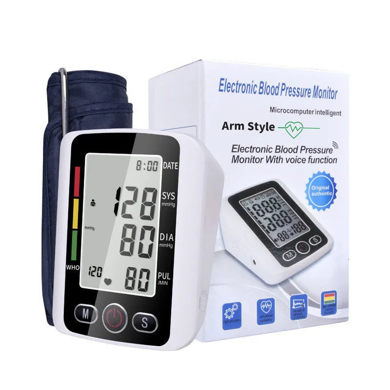Automatic arm blood pressure monitor with large screen display on a table.