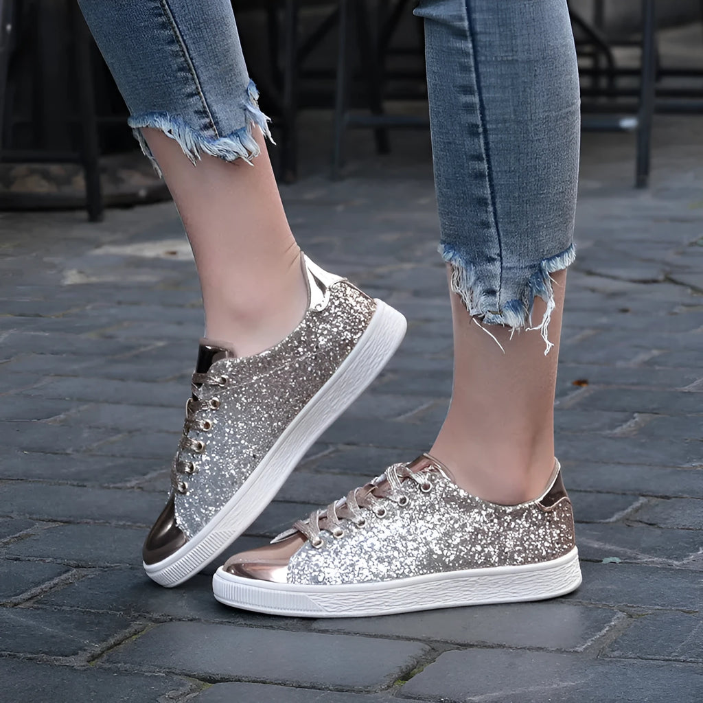 Women's low-top casual shoes with colourful sequin upper, round toe, and lace-up front in black, gold, or pink.