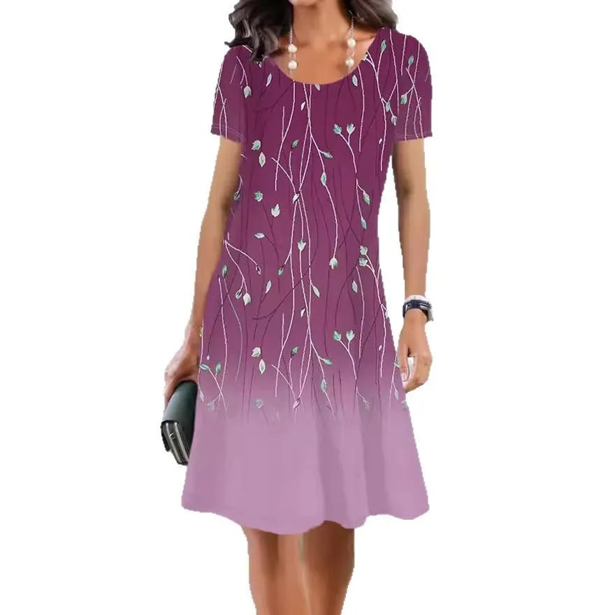 Women's floral print midi dress with short sleeves and a round neckline, shown in an A-line silhouette.