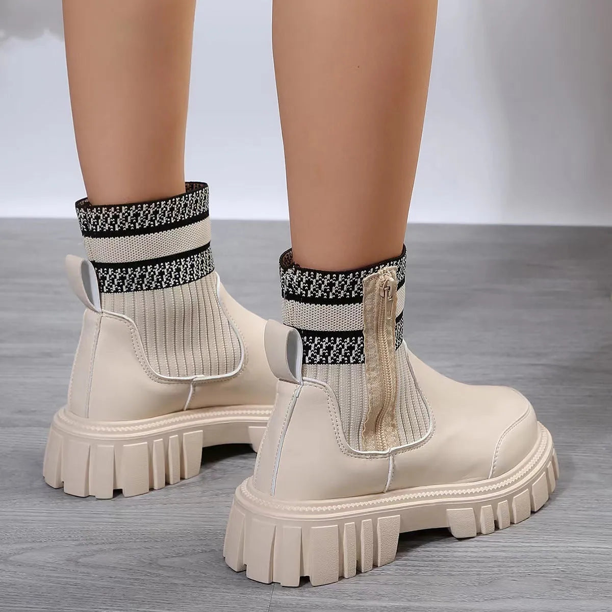Women's mid-tube Martin boots with side zipper, elastic knitted patchwork, and non-slip rubber sole in beige, black, or brown.