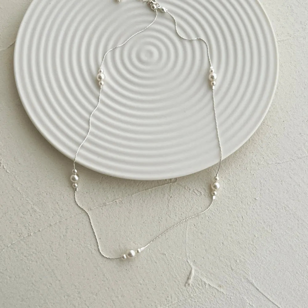 Women's 925 sterling silver pearl necklace in silver colour with round pendant, light luxury style