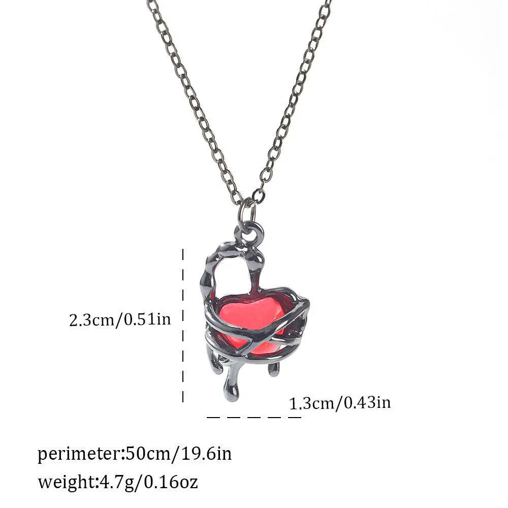 Dark Halloween necklace with bat and spider pendant designs on regular chain