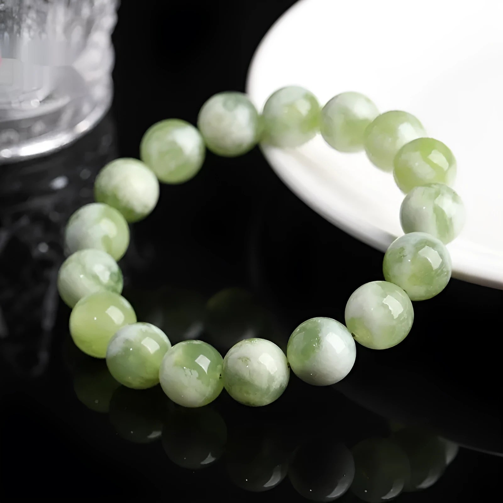 Green milk-in-water Xiuyan jade bracelet with geometric beads and polished finish