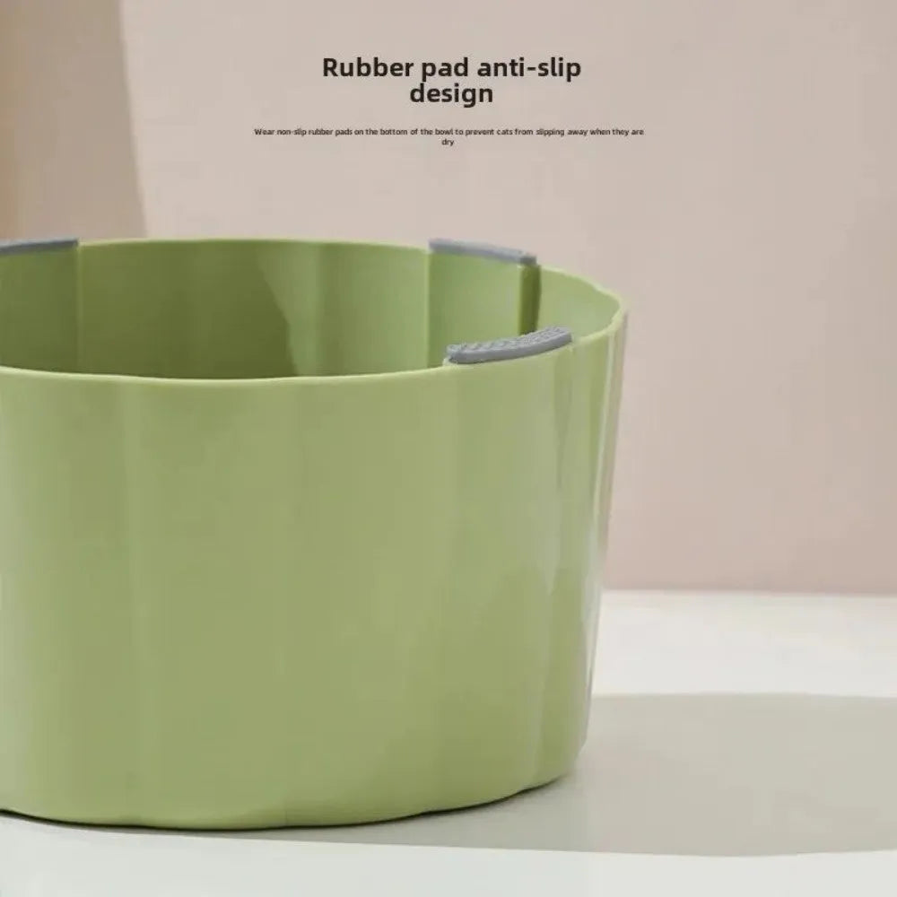Dark green cactus design cat bowl with high-stand construction and weighted anti-slip base