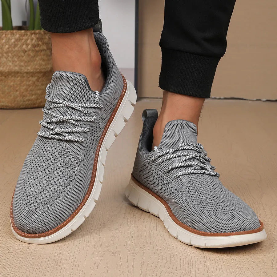 Men's grey mesh fabric casual sneakers with round toe and low heel design
