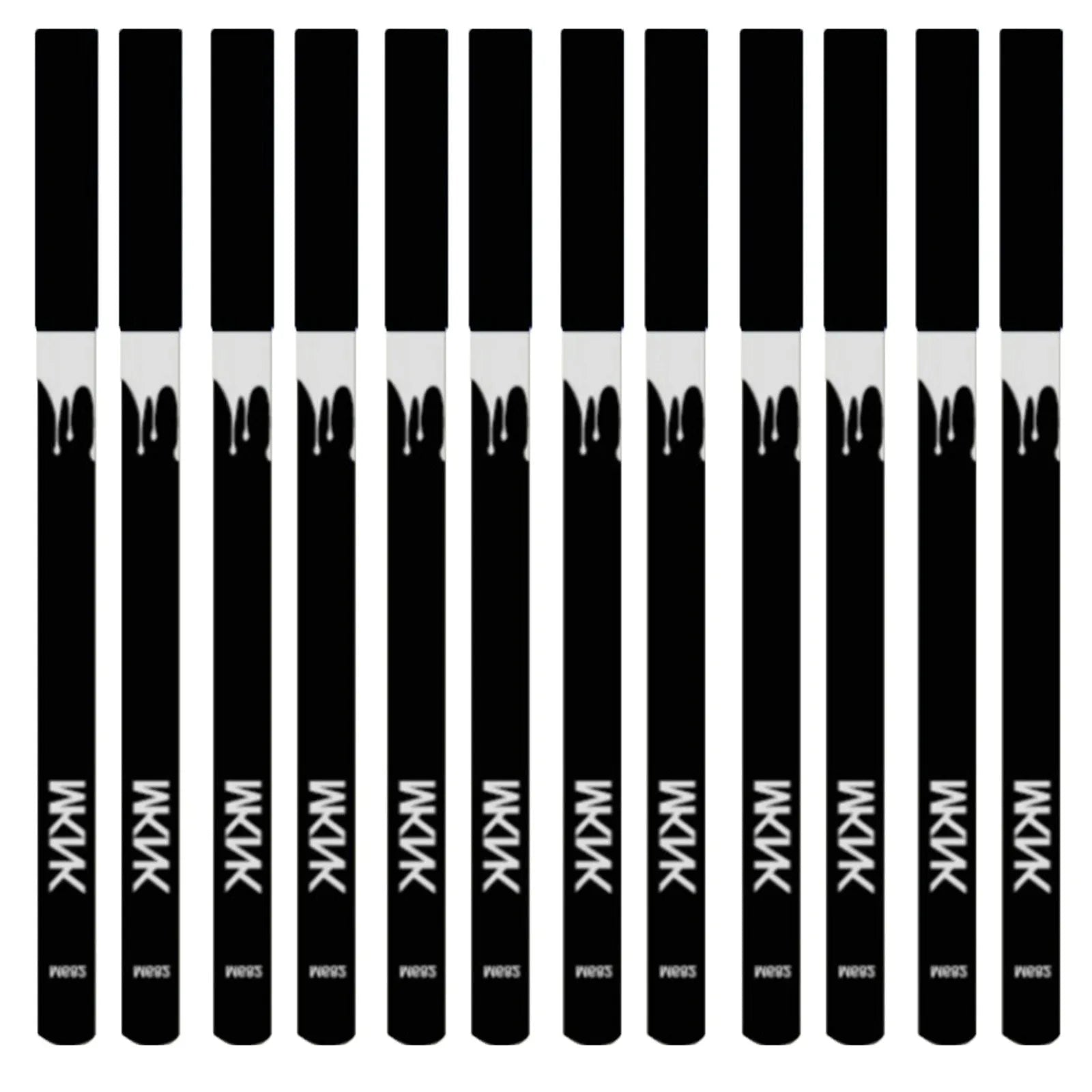12 white and black retractable eyeliner pencils and a sharpener laid out on a flat surface.