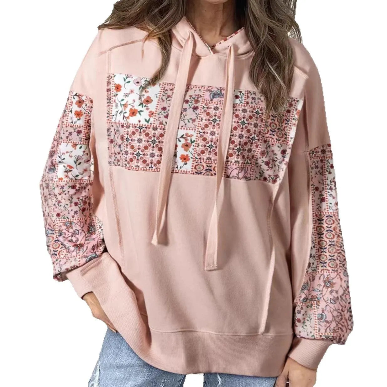 Women's pullover hoodie with drawstrings, loose fit, long sleeves, in pink colour, front view