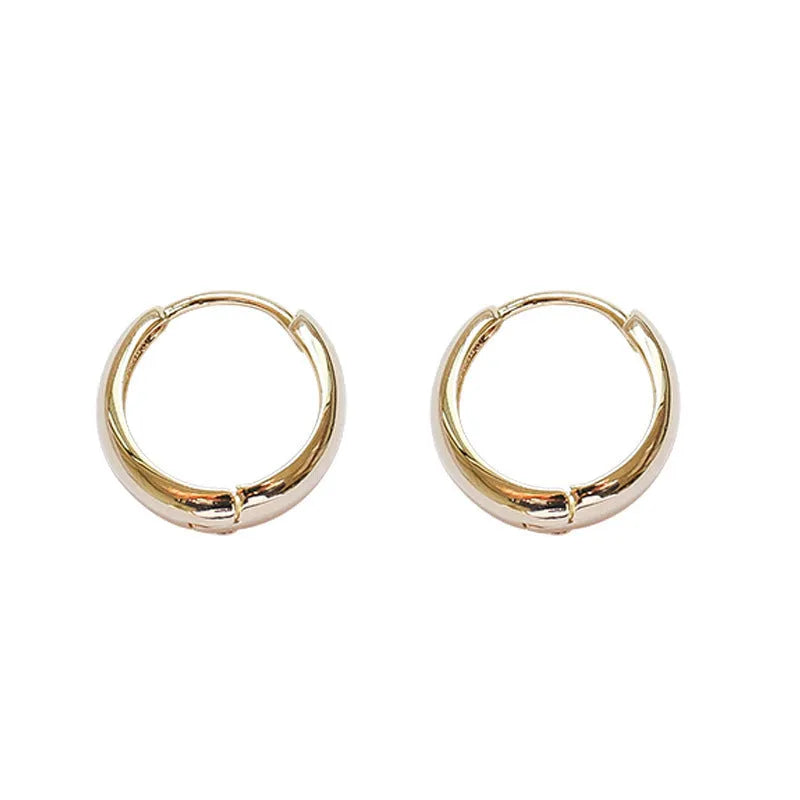 Women's geometric water drop earrings in gold or silver, shown in large, medium, and small sizes.