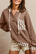 Straw yellow striped patchwork hoodie with waffle texture fabric and a drawstring hood.