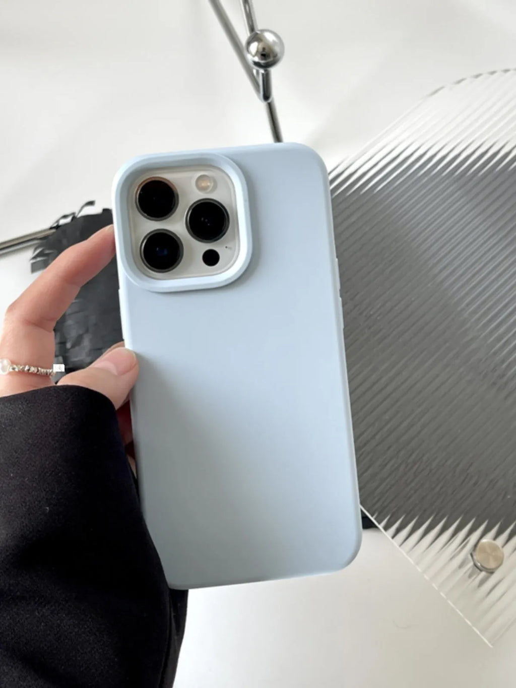Solid colour liquid silicone phone case in Sapphire Blue for iPhone 14 and iPhone 15 models
