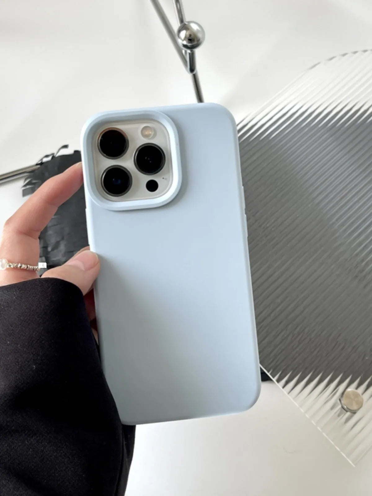 Solid colour liquid silicone phone case in Sapphire Blue for iPhone 14 and iPhone 15 models