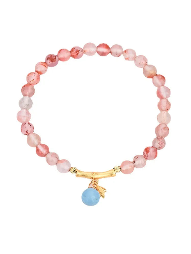 Nanhong agate bracelet with flower design and bamboo joint elements in ethnic style