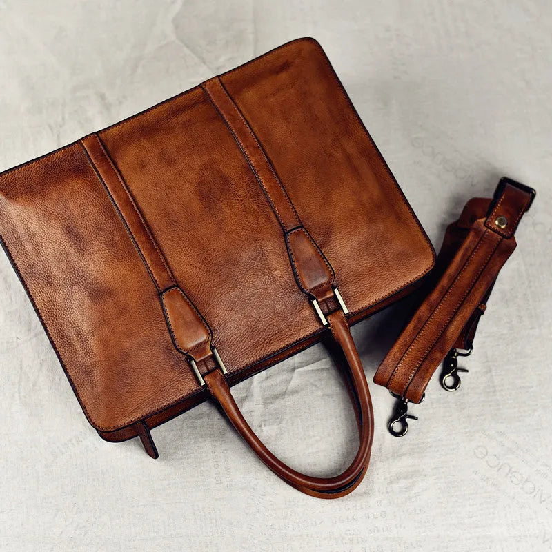 Men's brown leather horizontal business handbag with zipper closure showing retro design