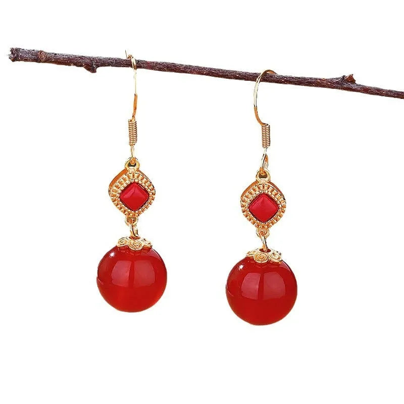Geometric copper alloy earrings with round red agate beads and S925 silver jasper inlay.