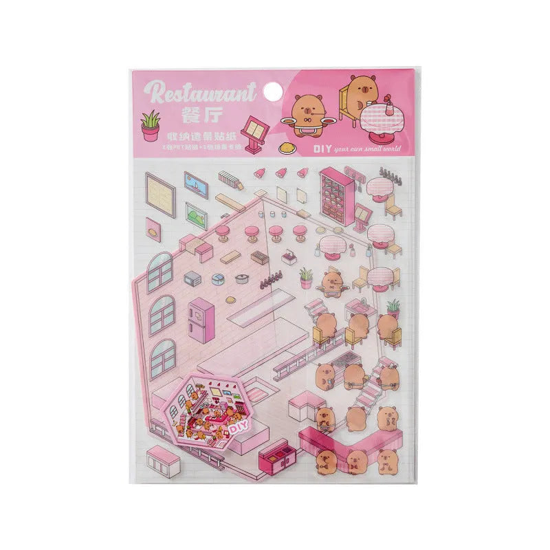 Pack of cut-free cartoon landscaping stickers showing bakery, bookstore, and flower shop scenes on a 190x125mm sheet.