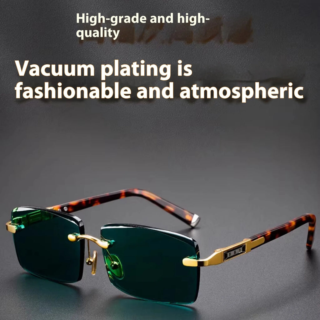 Dark green tinted frameless sunglasses with crystal lenses, shown with a hard protective case and cleaning cloth.