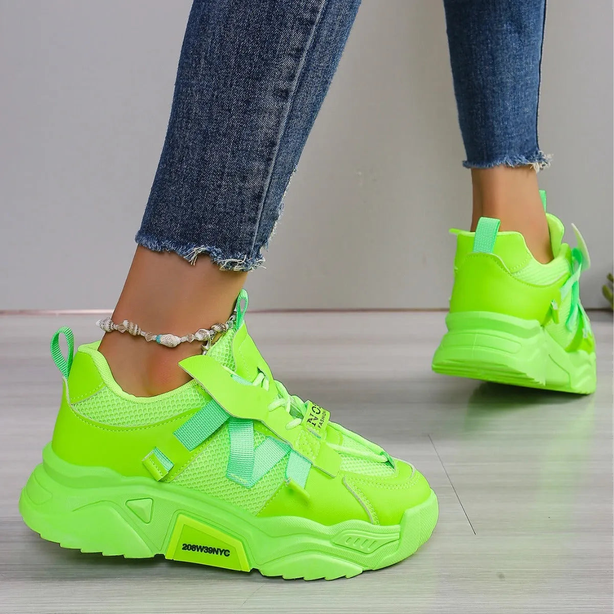 Women's platform mesh dad sneaker in multiple colours with lace-up front and thick sole.