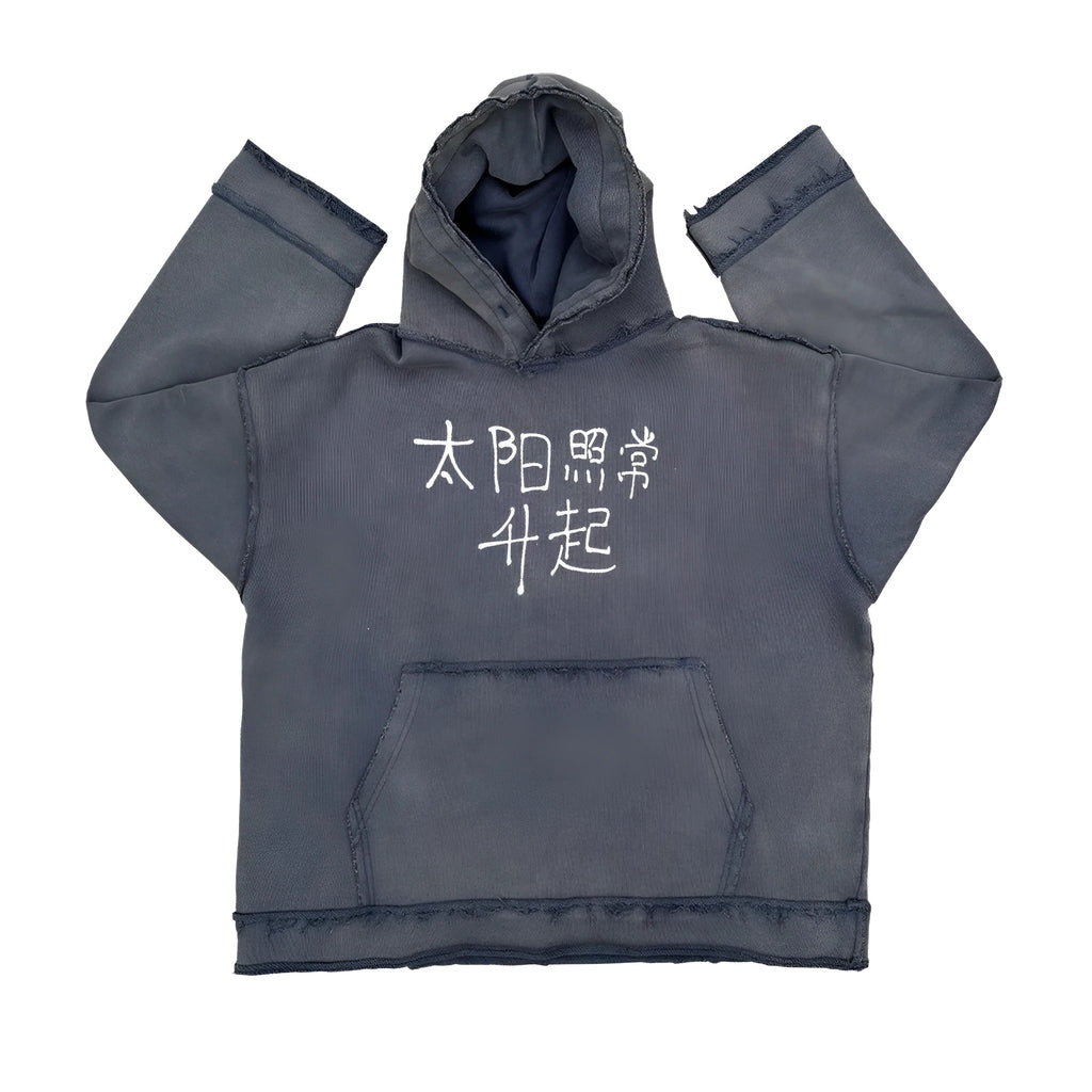 Man wearing a dark blue hoodie sweater, showing front view.