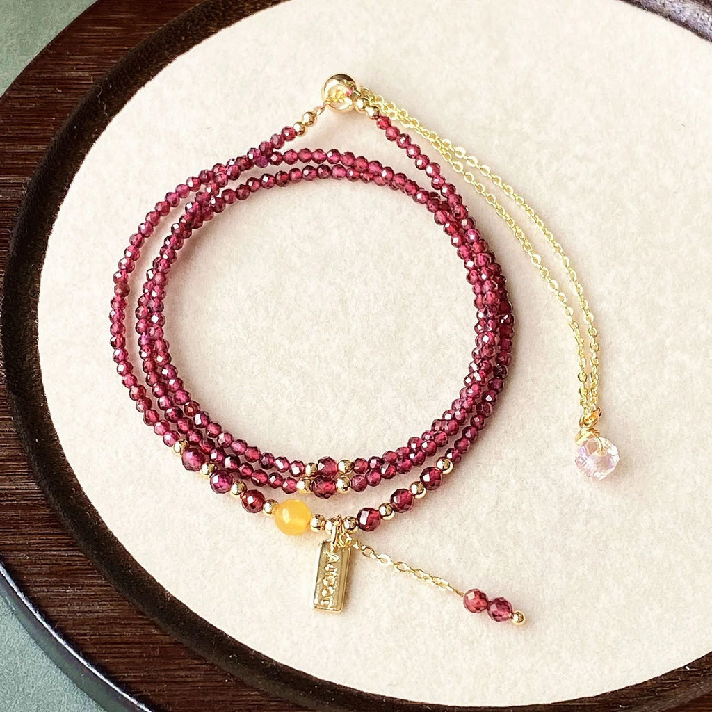 Garnet wine red bracelet and necklace set with beeswax cut surface and three-circle design