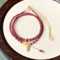 Garnet wine red bracelet and necklace set with beeswax cut surface and three-circle design