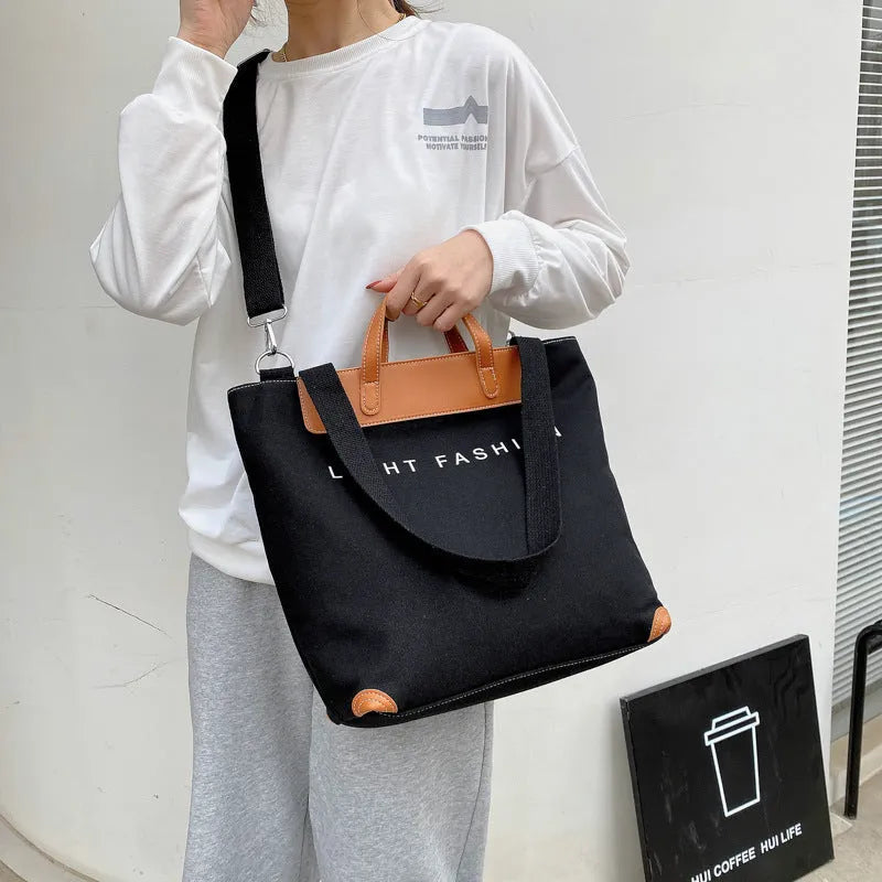 Canvas shoulder bag for women with letter print, large capacity, available in black, grey, white, khaki, and green colours