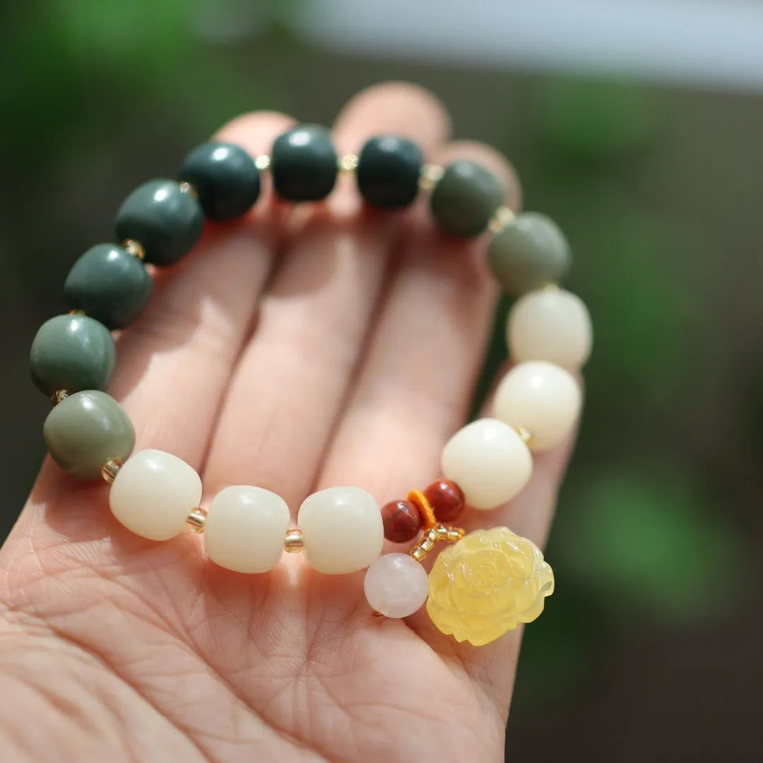 White jade gradient bodhi root bracelet with 10mm floral beads and beeswax lotus decorations