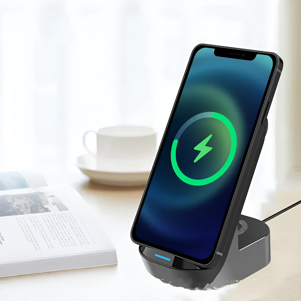 Black grey foldable 3-in-1 wireless charger stand with phone upright, watch and earbuds case on pads.