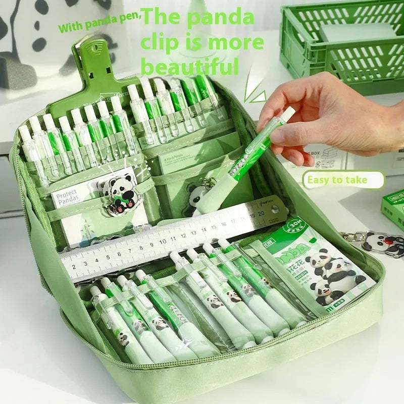 Green canvas panda pencil case showing twelve layered compartments open to reveal storage space