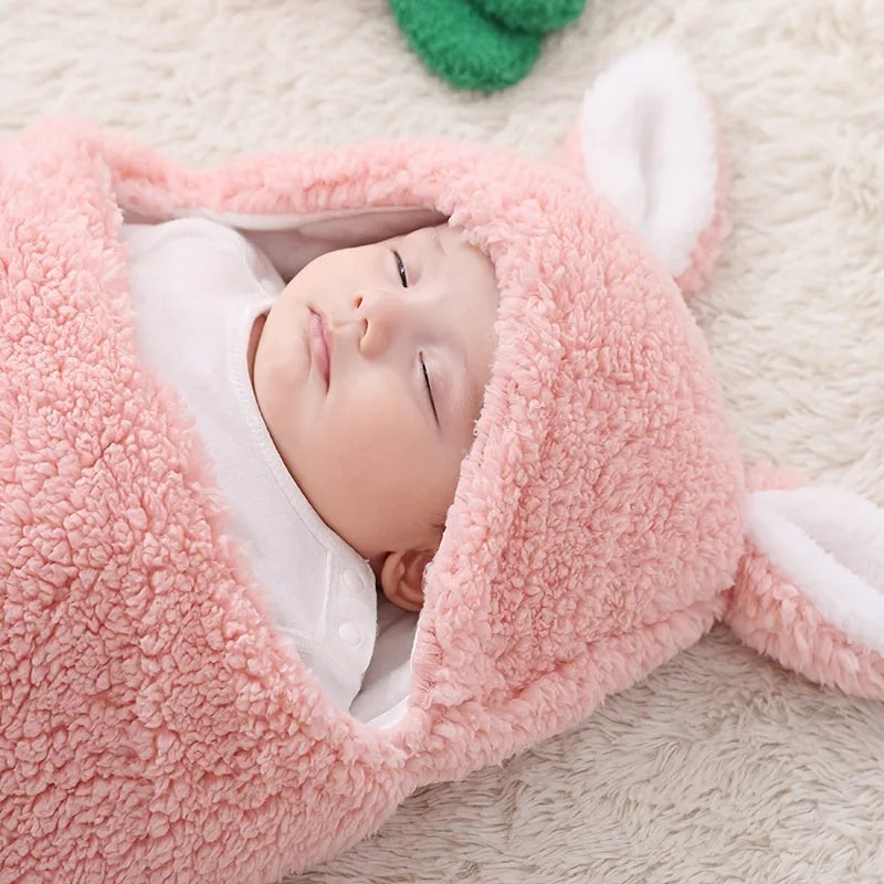 Baby wearing soft fleece sleeping bag with head support and velcro closures