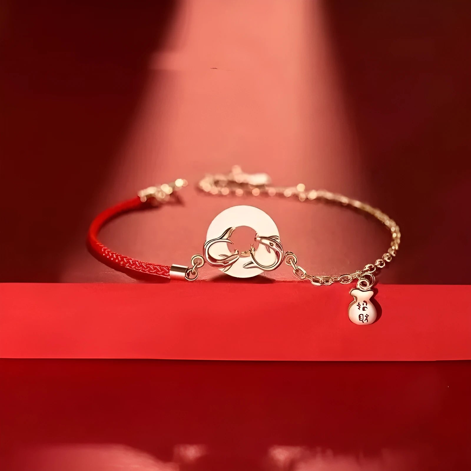 Japanese style festive koi bracelet with red rope, peace buckle, and electroplated finish for women